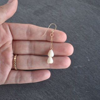 Double small mother of pearl Pikake earrings with paper clip chain design by Yay Hawaii, featuring dangling floral motifs.