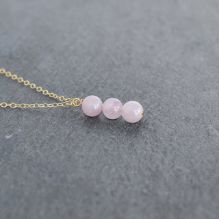 Vertical cluster pendant necklace featuring 6mm rose quartz beads in a sleek design by Yay Hawaii.