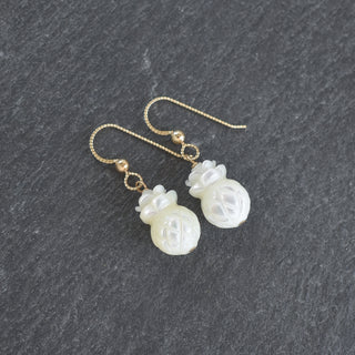 Mother of pearl pineapple earrings by Yay Hawaii, featuring shiny, detailed pineapple shapes with a tropical, elegant design.