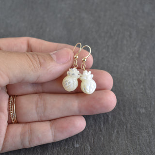 Mother of pearl pineapple earrings by Yay Hawaii featuring shiny, detailed pineapple shapes with tropical-inspired design.