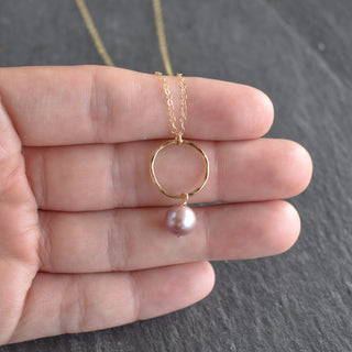 Small hoop necklace by Yay Hawaii featuring a light purple pearl pendant on a delicate silver chain.