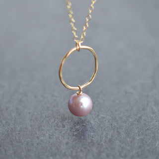 Small hoop necklace with light purple pearl from Yay Hawaii, featuring a delicate gold hoop and elegant pearl pendant.