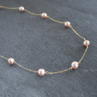 Dainty light purple pearl station necklace by Yay Hawaii featuring small round pearls on a delicate chain.
