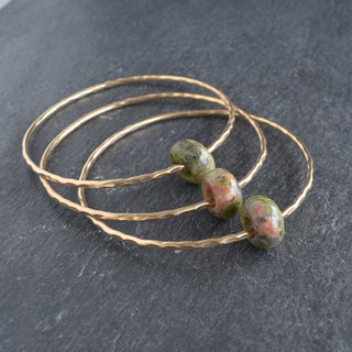Unakite rondelle gemstone bangle with colorful oval beads, handcrafted jewelry by Yay Hawaii, stylish and vibrant accessory.