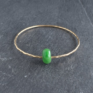 Yay Hawaii Jade Rondelle Gemstone Bangle featuring smooth green jade beads and a simple, elegant design for wristwear.