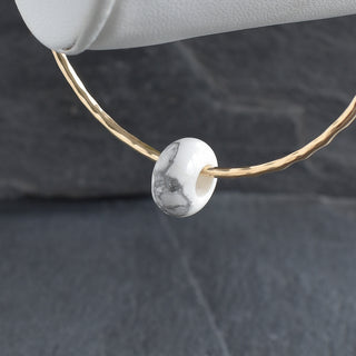 Yay Hawaii howlite rondelle gemstone bangle with polished white beads and silver-toned clasp, stylish and elegant jewelry accessory