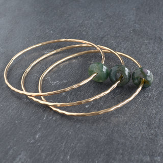 Indian Agate Rondelle gemstone bangle by Yay Hawaii featuring polished, multi-colored agate beads on a flexible bracelet.