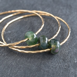 Indian Agate rondelle gemstone bangle with natural stone beads, crafted by Yay Hawaii, showcasing vibrant, polished agate stones.
