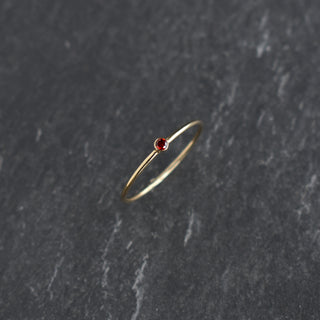 Dark red cubic zirconia stacking ring with garnet January birthstone from Yay Hawaii, featuring a sleek band design.