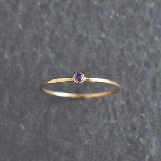 Purple CZ stacking ring featuring February amethyst birthstone by Yay Hawaii, showcasing a sparkling purple gemstone and silver band.