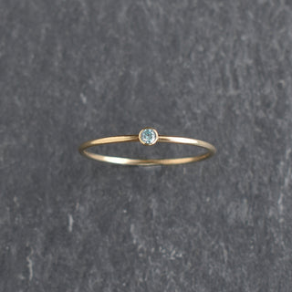 Light aqua CZ stacking ring with March aquamarine birthstone, from Yay Hawaii, featuring a sleek silver band and sparkling gemstone.