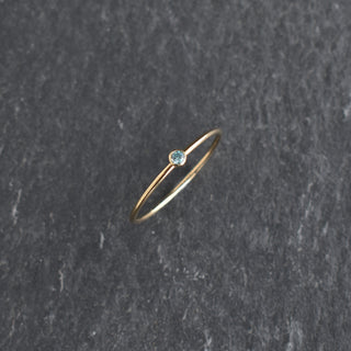 Light aqua CZ stacking ring featuring March aquamarine birthstone, crafted by Yay Hawaii, with sparkling gemstone accents.