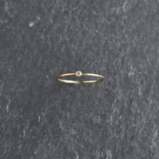 Clear CZ stacking ring featuring April diamond birthstone, crafted by Yay Hawaii, showcasing a sparkling gemstone set in a sleek band.