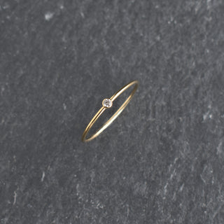Clear cubic zirconia stacking ring featuring April diamond birthstone by Yay Hawaii, open band with sparkling stones on silver finish.