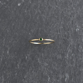 Green CZ stacking ring featuring May emerald birthstone by Yay Hawaii, showcasing a sparkling emerald-colored cubic zirconia on a silver band.