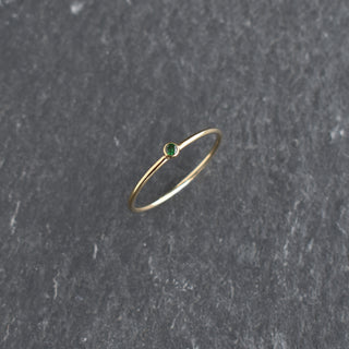 Green CZ stacking ring with May emerald birthstone by Yay Hawaii, featuring sparkling adjustable design and silver band.