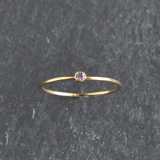 Light purple CZ stacking ring with June aventurine birthstone, crafted by Yay Hawaii, featuring a delicate band and sparkling stones.