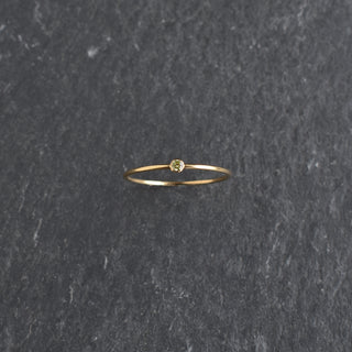 Light green CZ stacking ring featuring peridot birthstone, crafted by Yay Hawaii, showcasing a stylish and vibrant jewelry piece