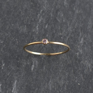 Light pink CZ stacking ring featuring pink tourmaline, October birthstone, from Yay Hawaii, displayed on a neutral background.