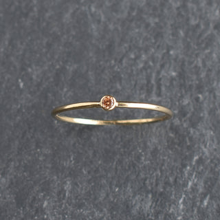 Champagne CZ stacking ring with topaz birthstone by Yay Hawaii, featuring a sparkling gemstone and delicate band design.