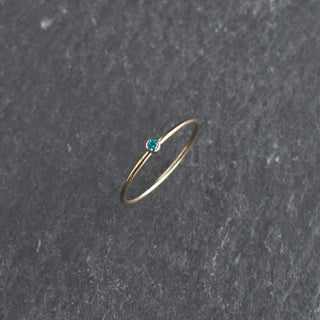 Aqua CZ stacking ring featuring a December birthstone zircon, crafted by Yay Hawaii, with a sleek silver band and sparkling gemstone.