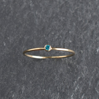 Aqua CZ stacking ring featuring a December birthstone zircon, crafted by Yay Hawaii, with a sleek silver band and sparkling gemstone.