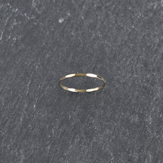 Faceted stacking ring from Yay Hawaii featuring multiple sparkling gemstones and a sleek, modern design.