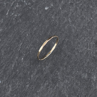Faceted stacking ring by Yay Hawaii featuring multiple silver bands with geometric cut facets for a modern look.