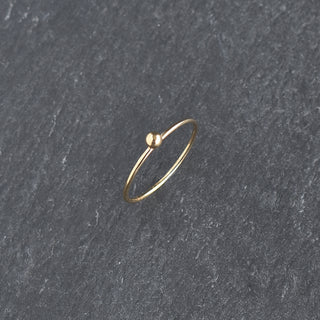 Colorful ball stacking ring by Yay Hawaii with multiple textured rings for stacking and play.