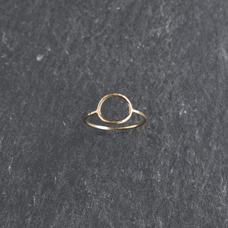 Yay Hawaii circle stacking ring with multiple silver bands, minimalist jewelry design, on a neutral background.