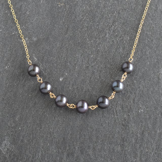 Yay Hawaii statement necklace with seven linked 8mm black freshwater pearls, elegant jewelry accessory