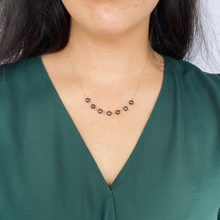 Yay Hawaii statement necklace with seven linked 8mm black freshwater pearls, elegant jewelry accessory.