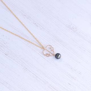 Monstera leaf pendant and black pearl necklace with silver or gold chain, featuring tropical jewelry design by Yay Hawaii.